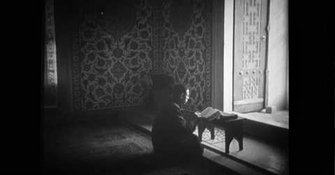 Man reading Holy Quran in mosque Stock Footage 43494565