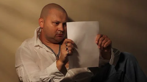 Man reading letter Stock Footage 8607273