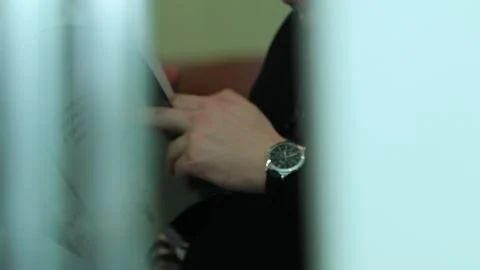 A man reading a magazine Stock Footage 153848661