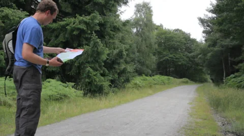 Man Reading a Map, Wyre Forest, Worcestershire, England, UK Video stock 35417354