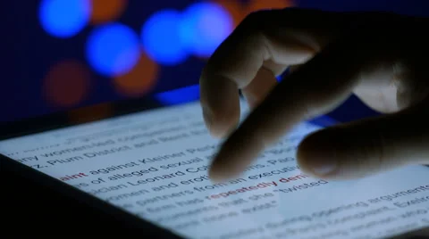 Man reading news on Tablet PC Stock Footage 47753141