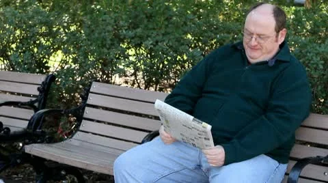 Man Reading Newspaper Stock Footage 10570316