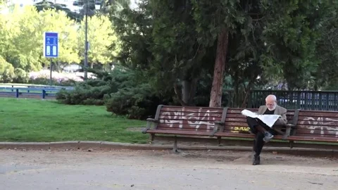 Man reading newspaper Stock Footage 69110029