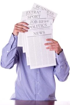 Man reading a newspaper Stock Photos