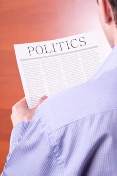 Man reading a newspaper Stock Photos