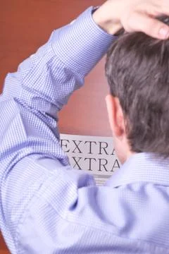 Man reading a newspaper Stock Photos