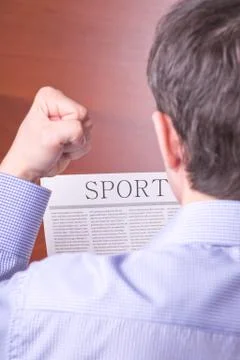 Man reading a newspaper Stock Photos