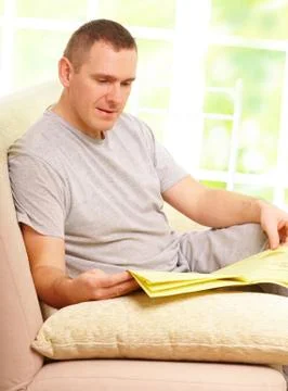 Man reading newspaper Stock Photos