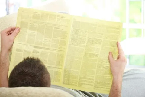 Man reading newspaper Stock Photos