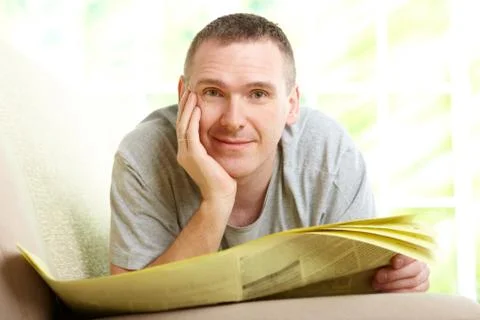 Man reading newspaper Stock Photos