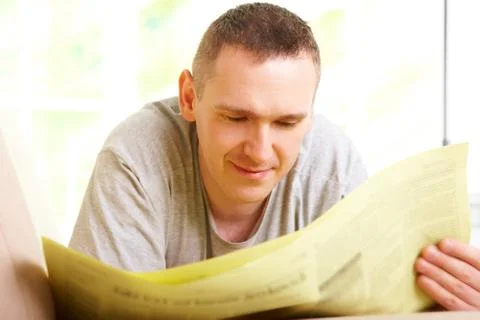 Man reading newspaper Stock Photos