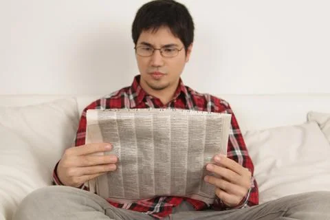 Man reading the newspaper Stock Photos