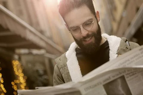 Man reading newspaper Stock Photos