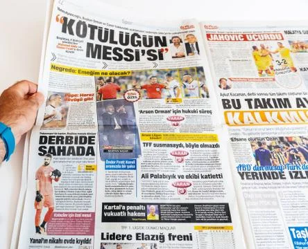 Man reading newspaper sabah Turkish newspaper sport page Stock Photos