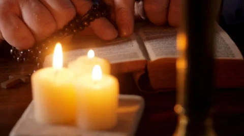 Man reading open bible, tracking shot Stock Footage 36438057