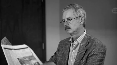 Man Reading Paper, Black and White Stock Footage 1369877