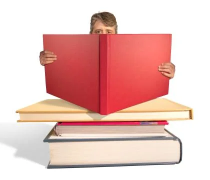 Man reading the stack of big books Foto stock
