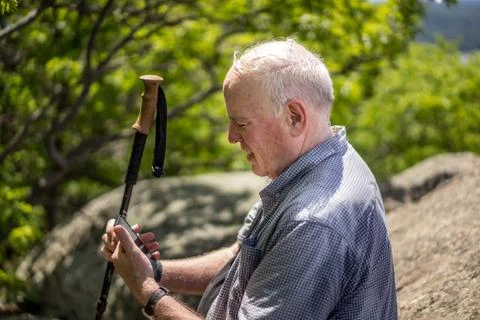 Man reading steps on smartphone Stock Photos