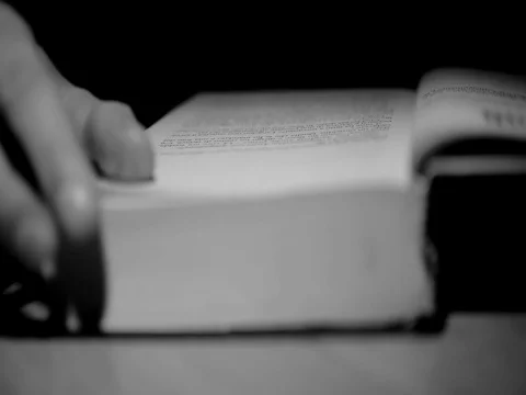 Man reads a book Stock Footage 80694374