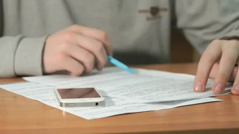 Man reads document text on paper. Close-up Stock-Footage 88505724
