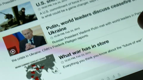 Man reads the news on tablet computer Video stock 47759090