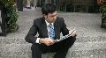 Man reads newspaper. HD Footage