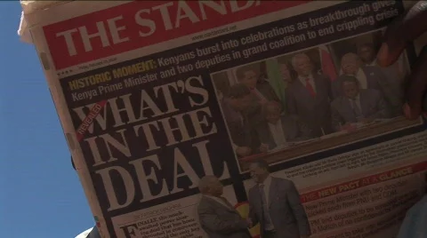 Man reads newspaper Stock Footage 626151