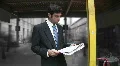 Man reads newspaper. Time lapse commuters in background. HD Footage