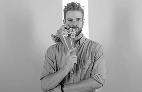 Man ready for date bring pink flowers. Guy bring romantic pleasant gift waiting Stock Photos
