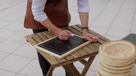Man ready to write on the chalkboard. Stock Footage 56030745