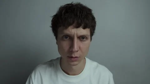 Man realizing something is terribly wrong and staring in disbelief Video stock 323437721