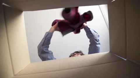 Man received parcel and concept of unpacking, delivery and online shopping. Stock Footage 263719618