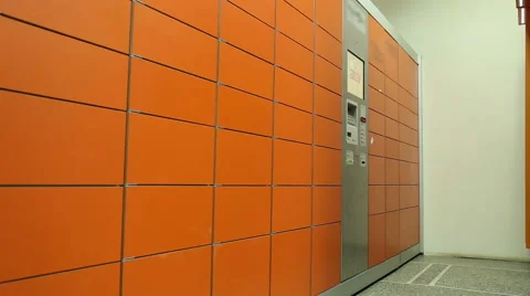 A man receives a package in the mail postal terminal Stock Footage 61390529