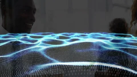 Man receiving animated pulsing waveform overlay at desk, causing smile growth Vidéo 317183870