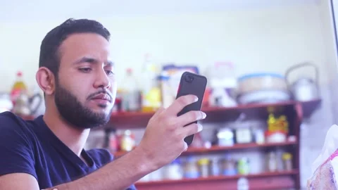 Man receiving a notification and getting upset and disappointed Video stock 153102465