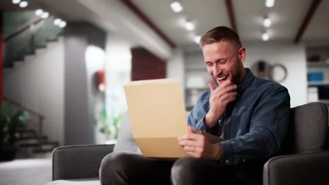 Man Receiving Parcel Or Delivery Package Stock Footage 296918400