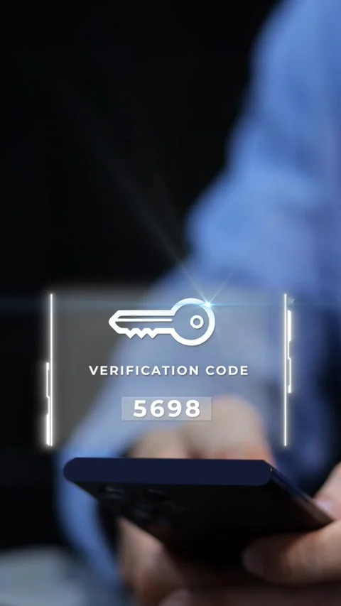 Man receiving verification code on smartphone for secure login. Two-factor Stock Footage 330951745
