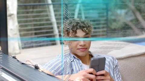Man reclining lounger by pool tapping phone and viewing tech code overlay Stock Footage 333477711