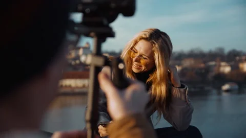 Man record on Camera steadycam, Young women fashion bloggers recording video Stock Footage 218304396