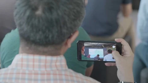 The man is recording on the phone 動画素材 116246635