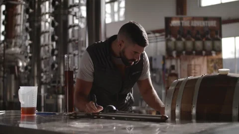 A man recording scienific results Stock Footage 137676464