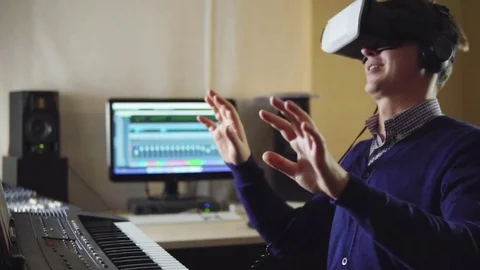The man in the recording Studio via virtual reality glasses Stock Footage 72445186