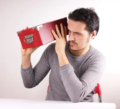 Man with red box Stock Photos