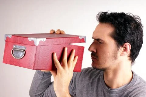 Man with red box Stock Photos