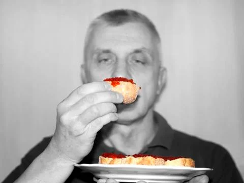 Man With Red Caviar Photos