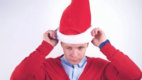 Man in red Christmas hat Stock Footage 82202361