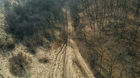A man in a red jacket hiking the mount. Drone Aerial Stockbeeldmateriaal 151647714