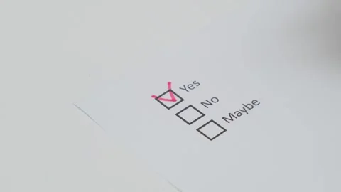 Man red pen marking on checklist in box yes Stock Footage 281774519