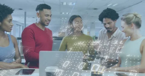 Man in red sweater leaning in, discussing tech with code overlay on laptop or Stock Footage 320089127