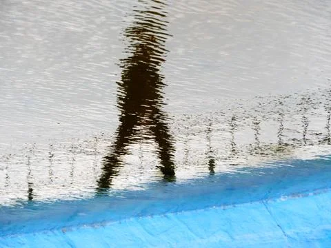 The man reflection in the water Stock Photos